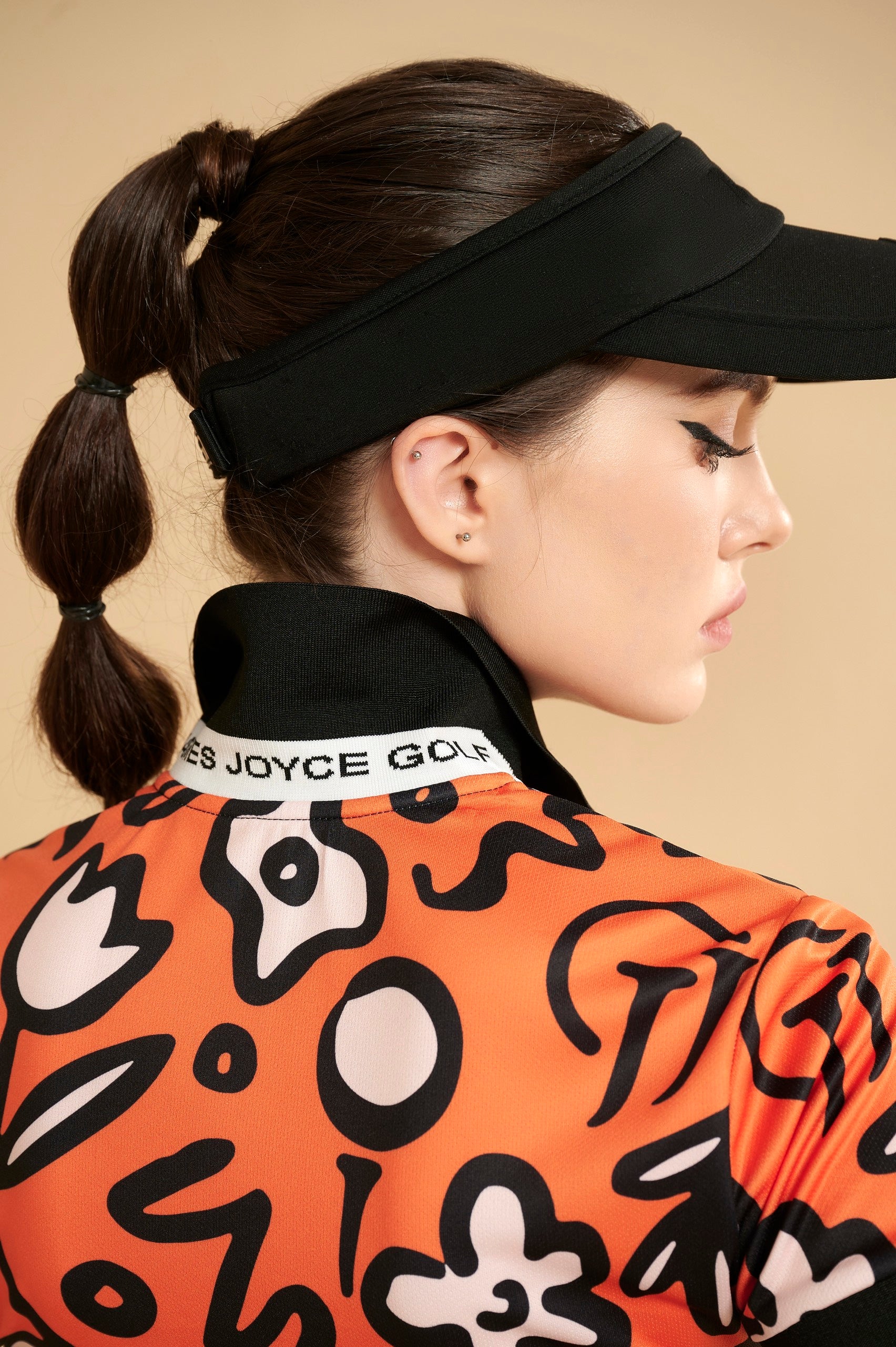 WOMEN ORANGE FLOWER POLO