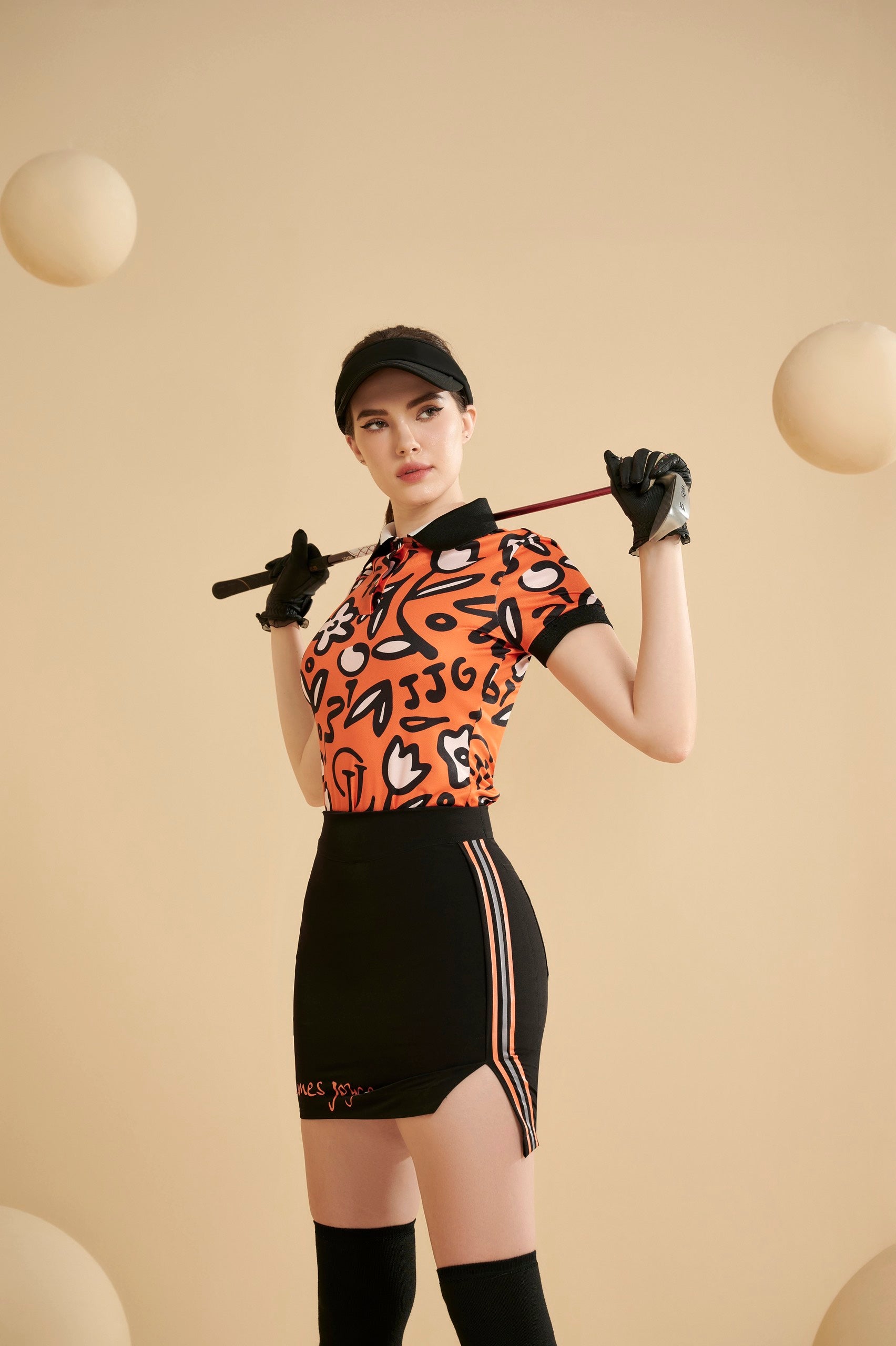 WOMEN ORANGE FLOWER POLO